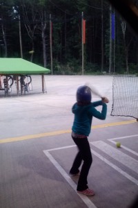 Lili at the batting cage