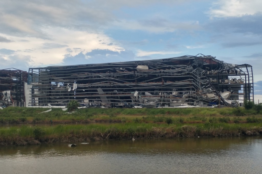 Wrecked 5-story boat storage facility